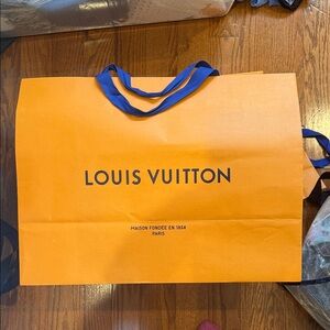 Louis Vuitton Vibrant Orange Shopping Bag with Blue Handles